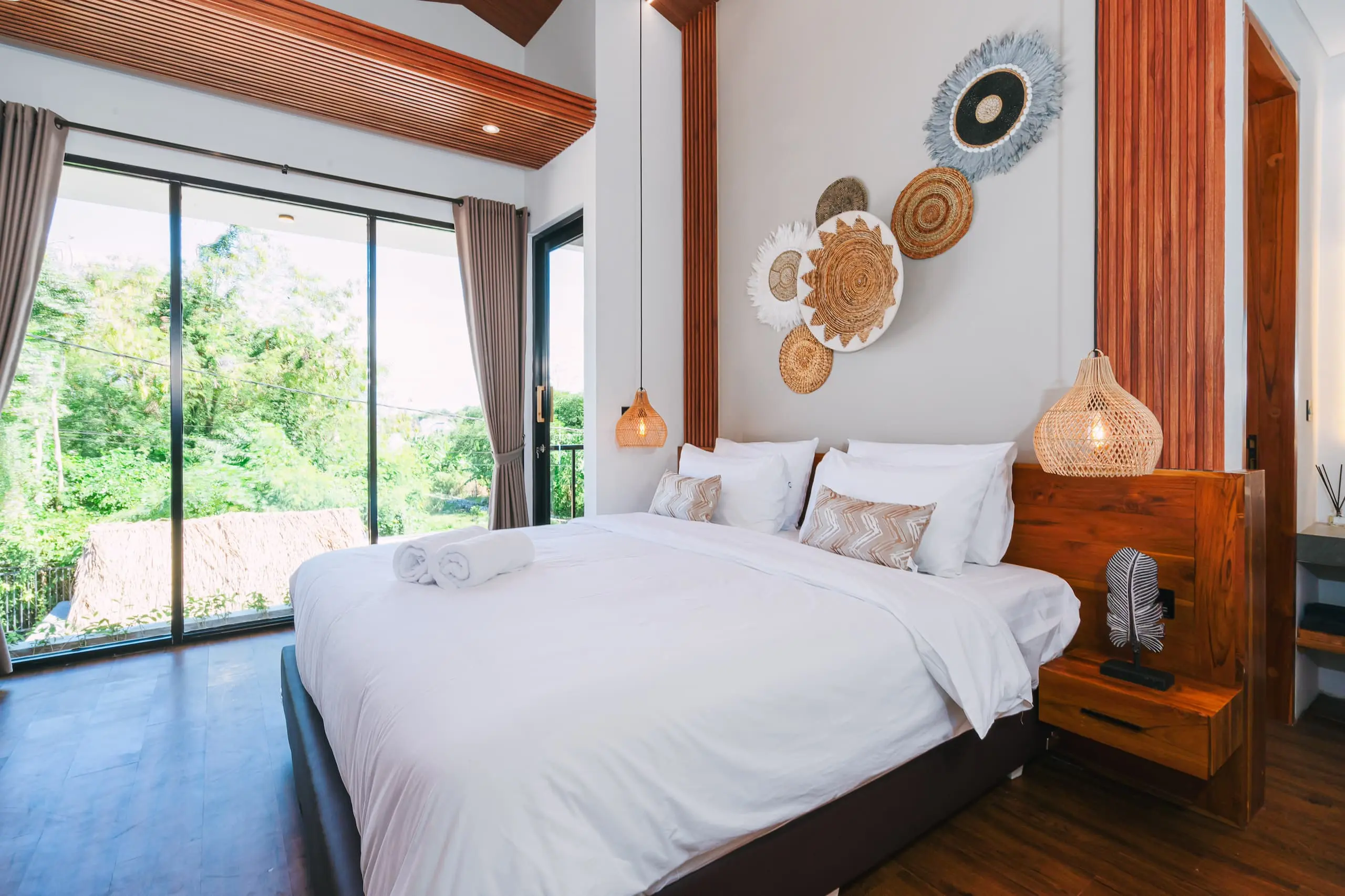 Luxury comfortable bedroom at Nirav Villa in Uluwatu, Bali.